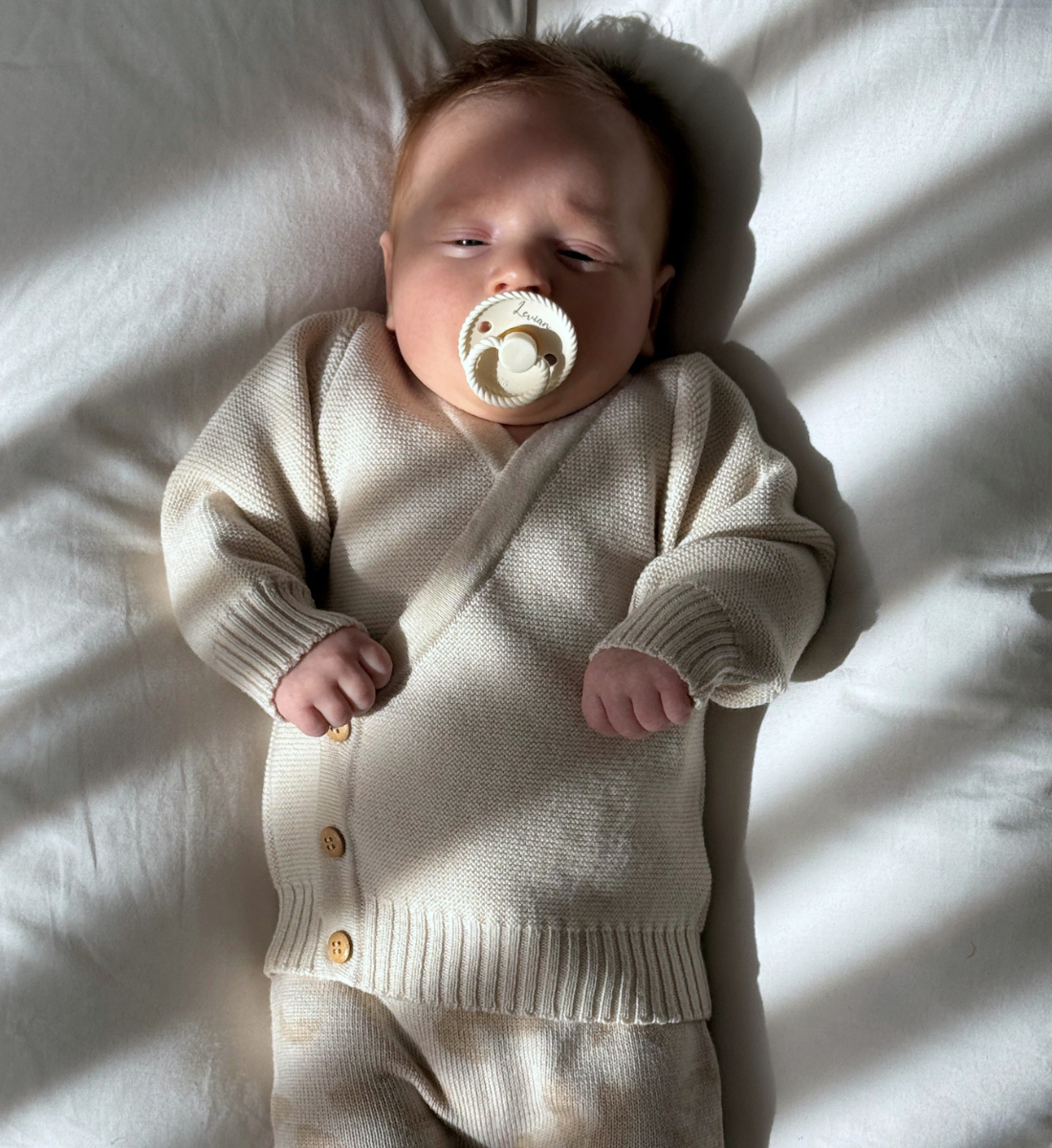 Wickeljacke aus 100% Merinowolle Baby Lil' Leo Babybekleidung mitwachsend