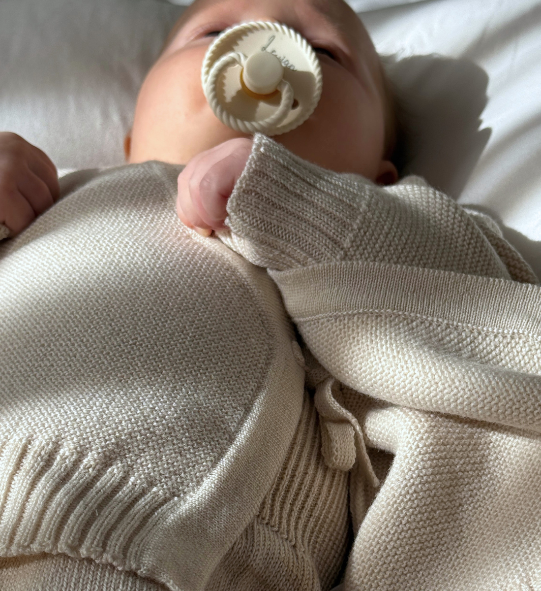 Wickeljacke aus 100% Merinowolle Baby Lil' Leo Babybekleidung mitwachsend