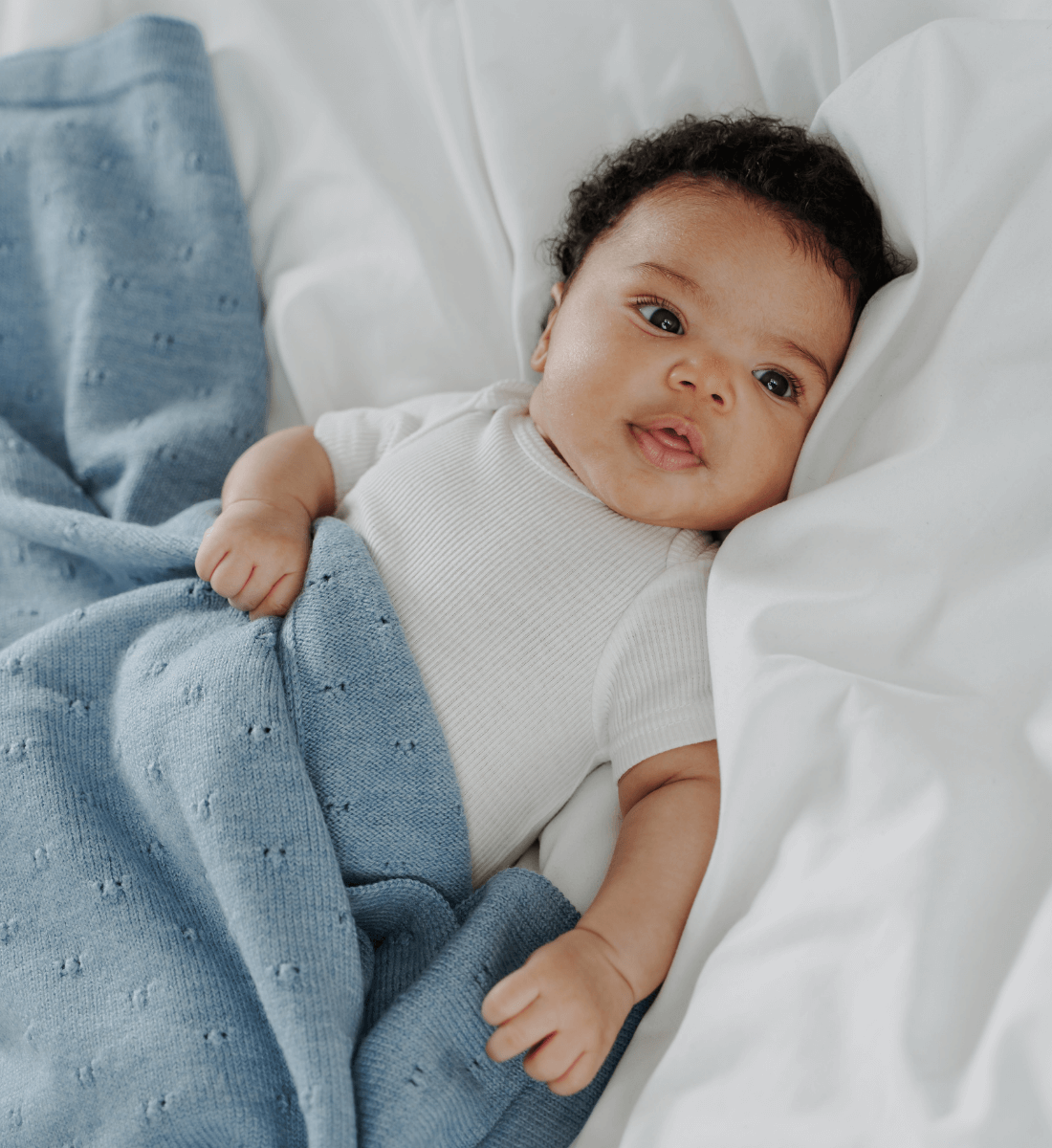 Limited Edition: Decke 'Leo' in Blau Melange mit Muster aus 100% Merinowolle