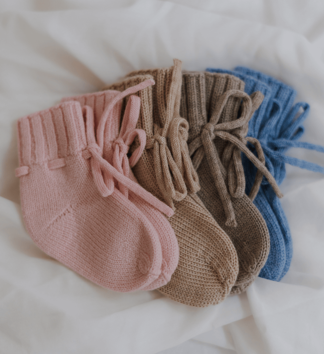 Babybekleidung Babydecke Babyschuhe Babysocken aus Merinowolle Lil' Leo