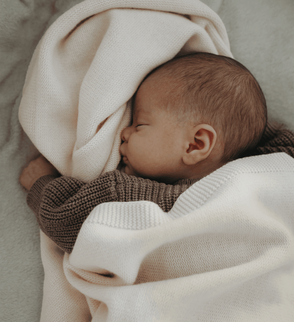 Decke in Creme aus 100% Merinowolle