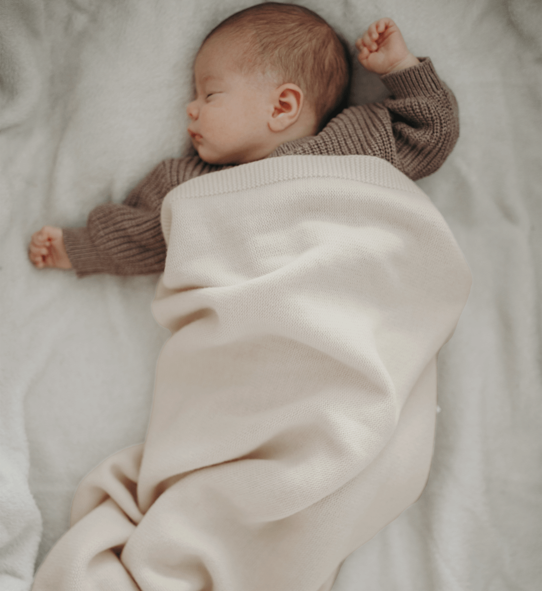 Decke in Creme aus 100% Merinowolle