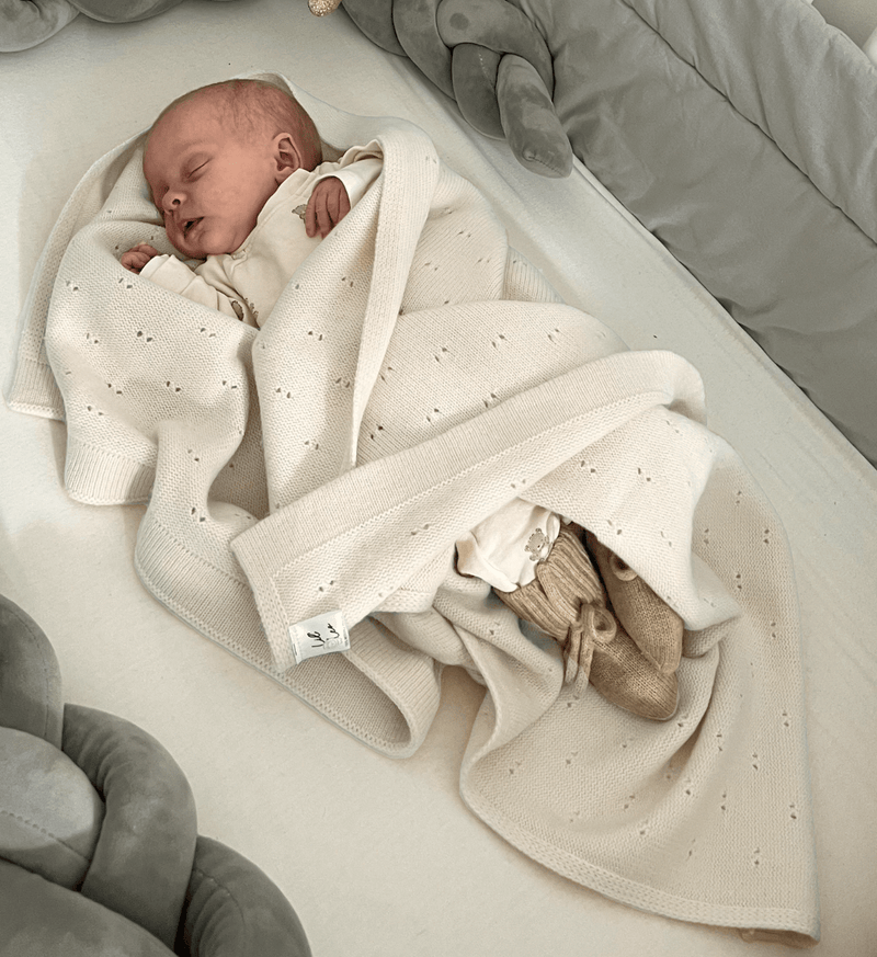 Decke 'Leo' in Creme mit Muster aus 100% Merinowolle