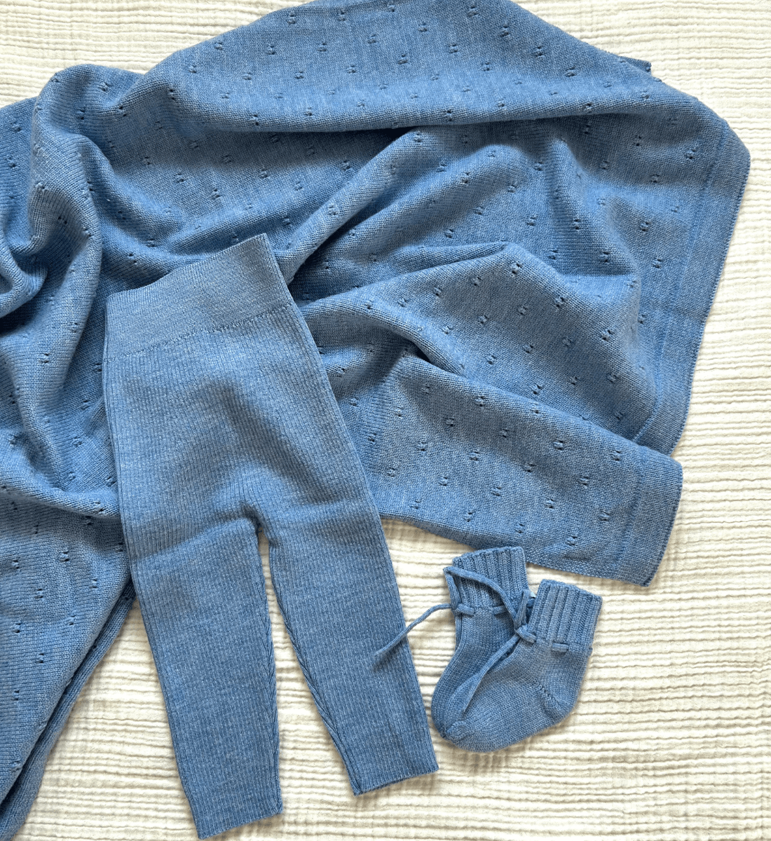 Babybekleidung und Babydecke aus Merinowolle Lil' Leo