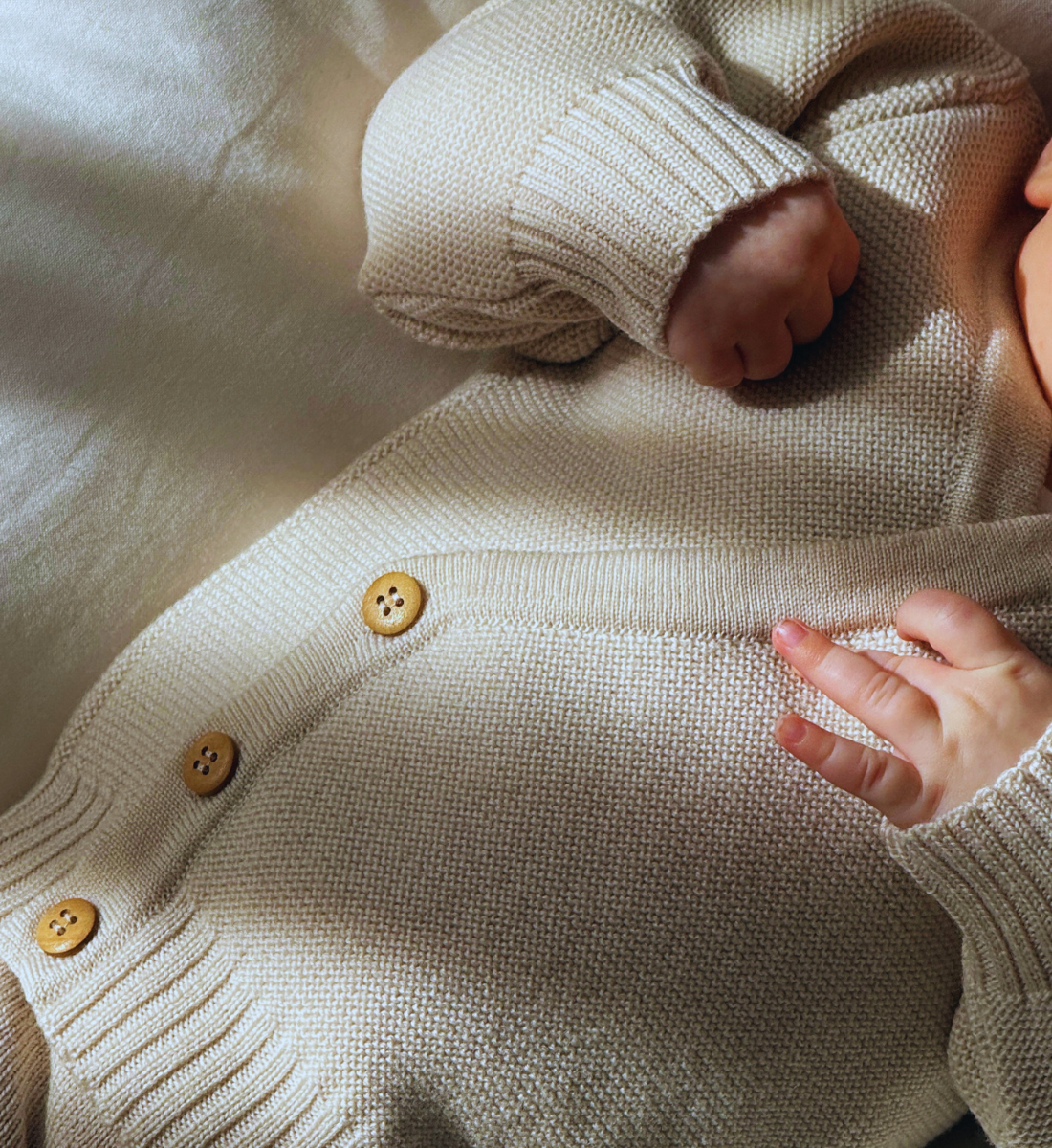 Wickeljacke aus 100% Merinowolle Baby Lil' Leo Babybekleidung mitwachsend