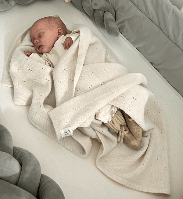 Decke 'Leo' in Creme mit Muster aus 100% Merinowolle